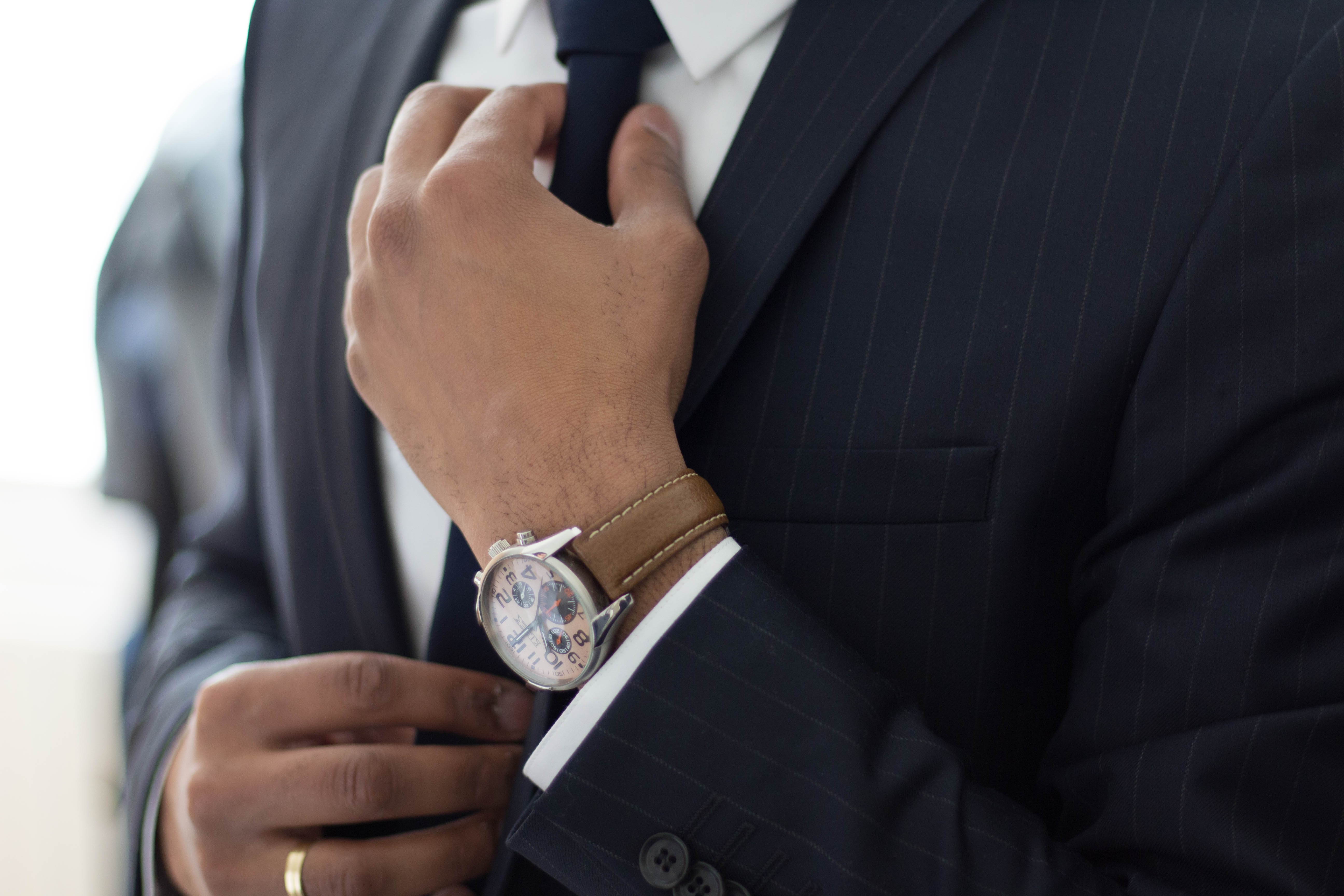 Business man, adjusting his tie, ready to do some business